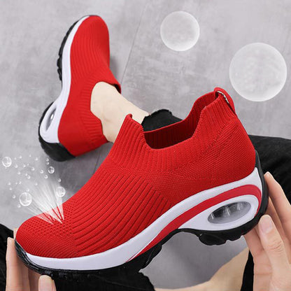 Sneakers Women Air Cushion Mesh Breathable Running Sports Shoes in red color with breathable upper and cushioned sole.