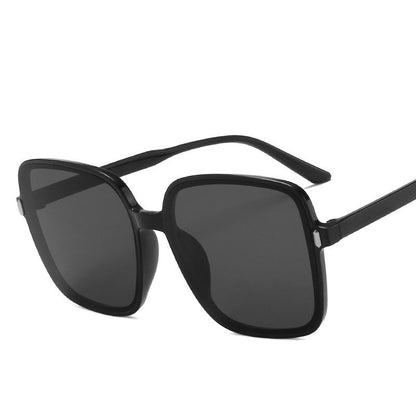 Big Square Sunglasses in black with dark lenses, stylish and protective eyewear for fashion enthusiasts.